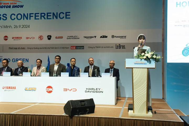 Christy hosting a Vietnam Motor Show press conference